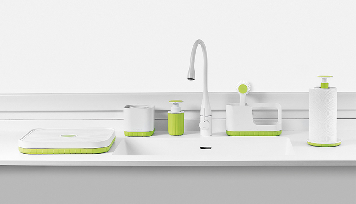 Guzzini kitchen products arranged by a sink